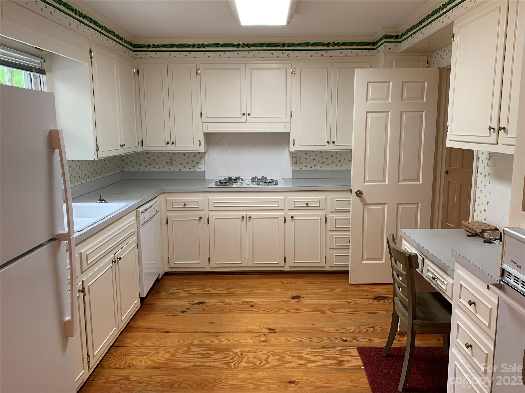 909 Nightingale Road Rock Hill, SC 29732 - Photo 8 of 38 a kitchen with granite countertop a sink stove and cabinets