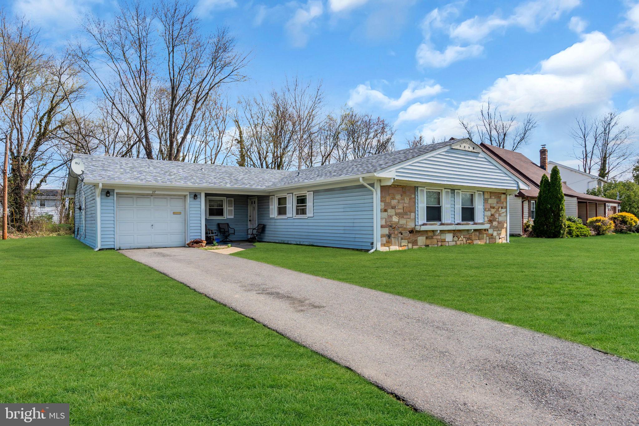 27 Genesee Lane Willingboro, NJ 08046 - Photo 1 of 25 a front view of a house with a yard and trees