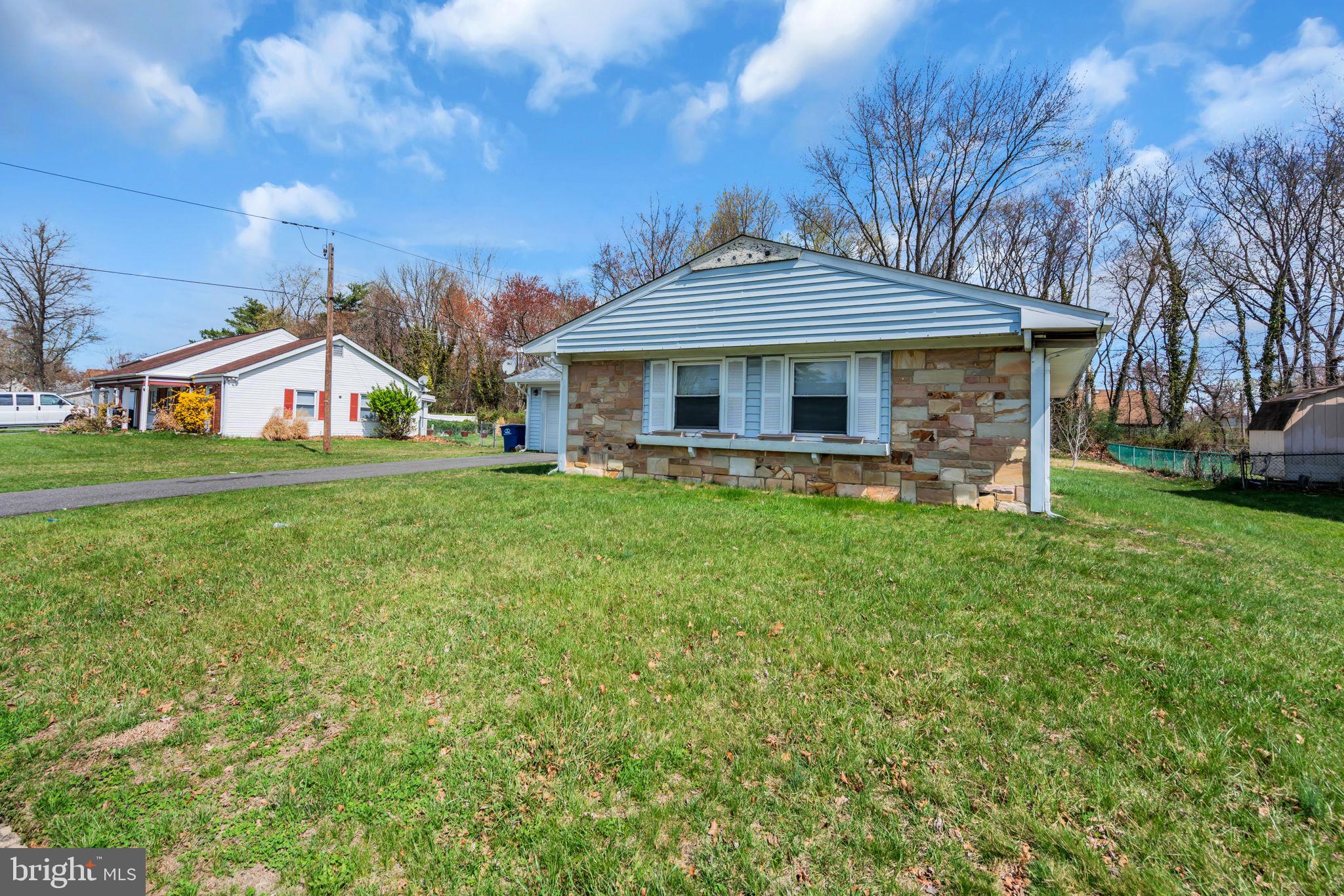 27 Genesee Lane Willingboro, NJ 08046 - Photo 25 of 25 a front view of a house with a yard