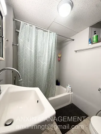 a bathroom with a sink and a tub