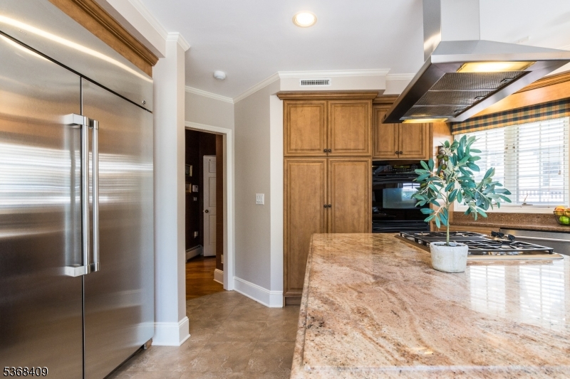 12 Kips Ridge, Unit 12 Montclair, NJ 07042 - Photo 14 of 37 a kitchen with refrigerator and window