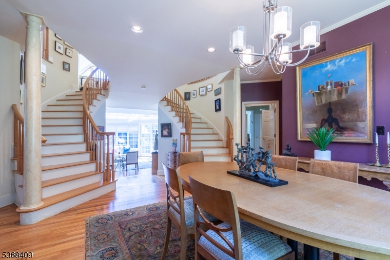 12 Kips Ridge, Unit 12 Montclair, NJ 07042 - Photo 16 of 37 a view of a dining room with furniture and wooden floor