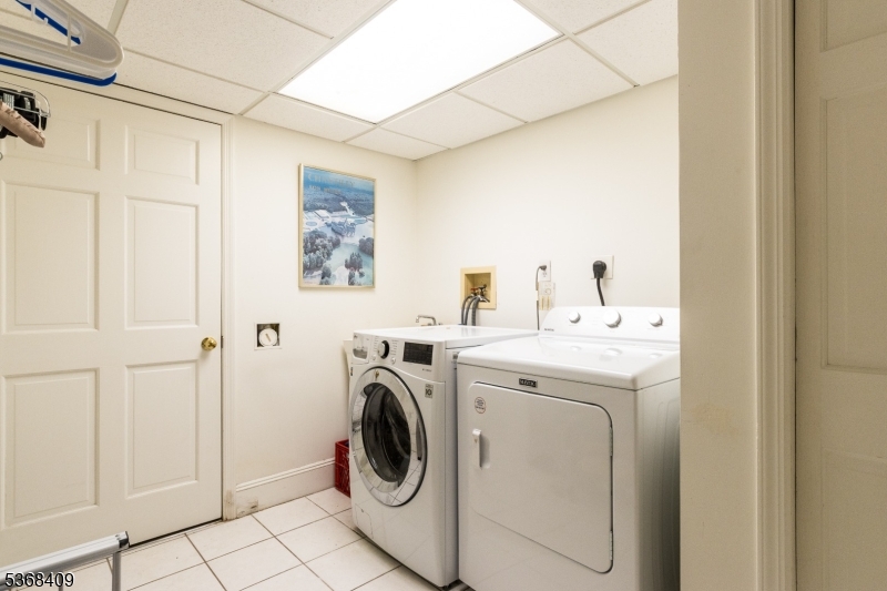 12 Kips Ridge, Unit 12 Montclair, NJ 07042 - Photo 31 of 37 a utility room with dryer and washer