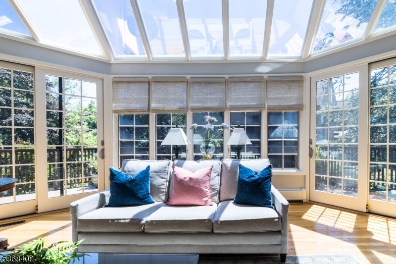 12 Kips Ridge, Unit 12 Montclair, NJ 07042 - Photo 4 of 37 a living room with furniture and floor to ceiling windows