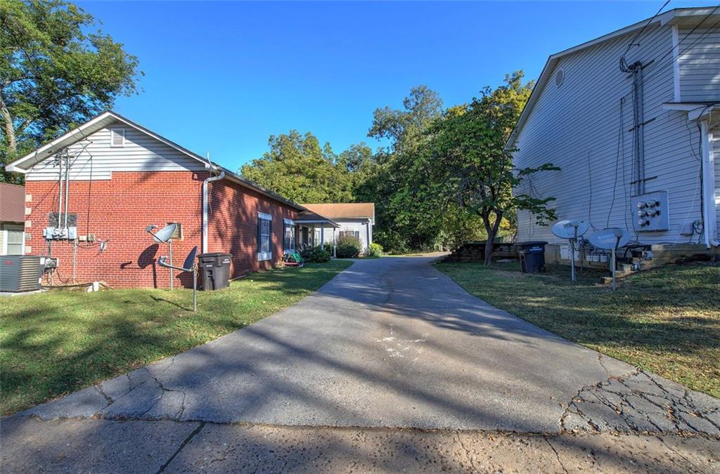 204 Johnson Street Cartersville, GA 30120 - Photo 13 of 27 a view of a house with a yard