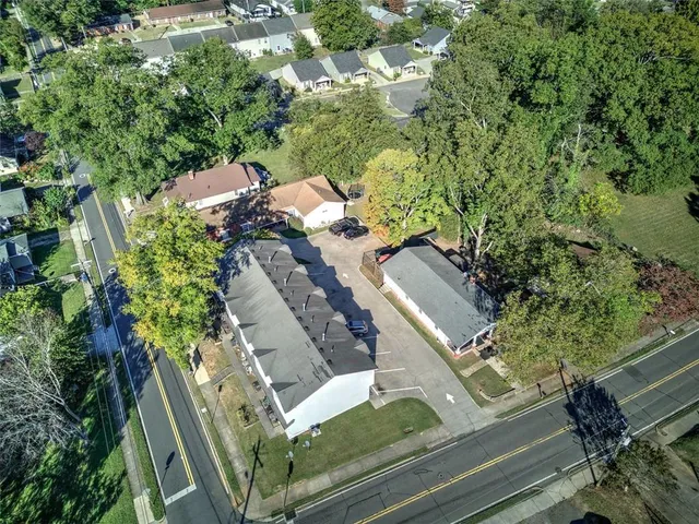 an aerial view of a house with outdoor space