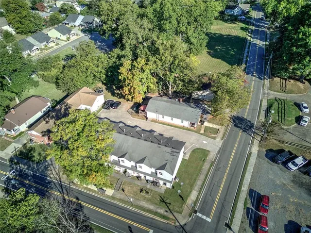 an aerial view of a house with outdoor space