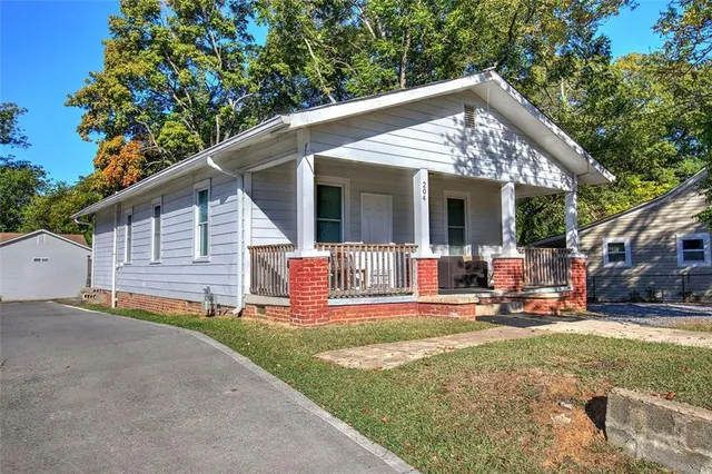 a house with trees in front of it