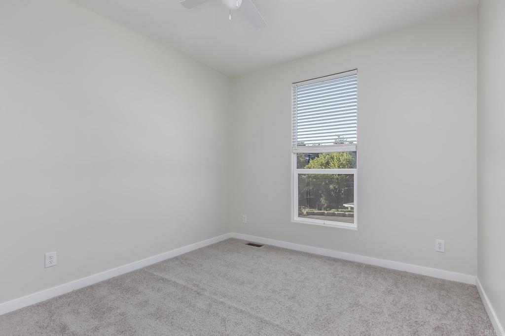 365 Alpine Heights Road Alpine, CA 91901 - Photo 21 of 52 an empty room with a window