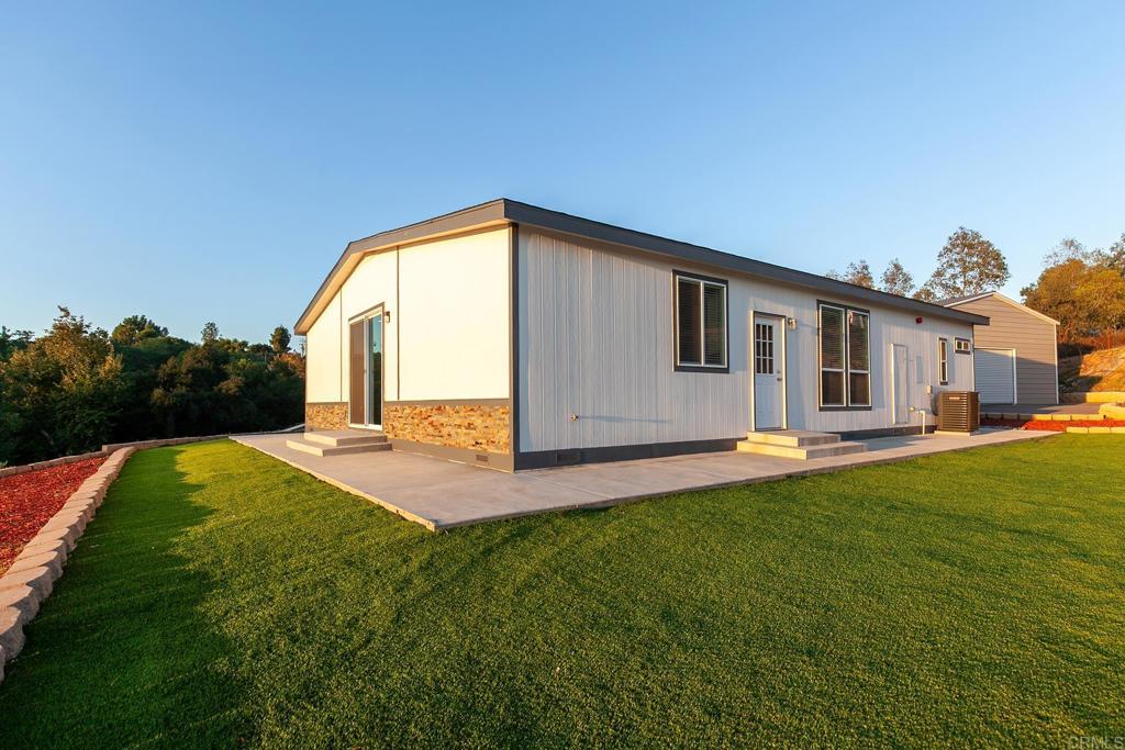 365 Alpine Heights Road Alpine, CA 91901 - Photo 49 of 52 a front view of a house with a garden and deck