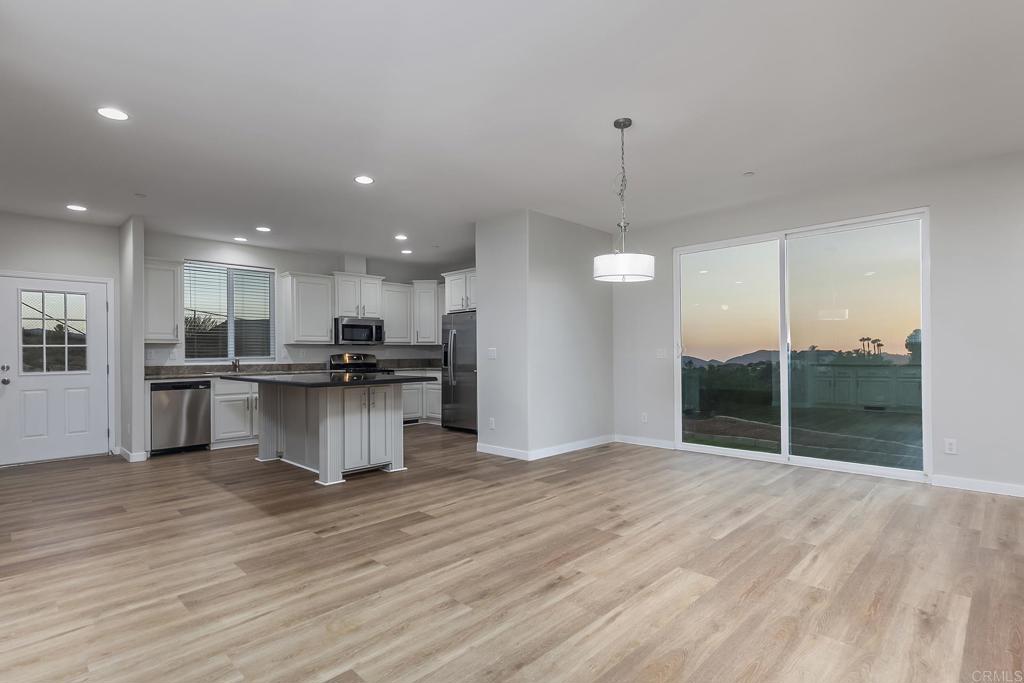 365 Alpine Heights Road Alpine, CA 91901 - Photo 6 of 52 a view of kitchen with kitchen island stainless steel appliances refrigerator stove top oven and cabinets