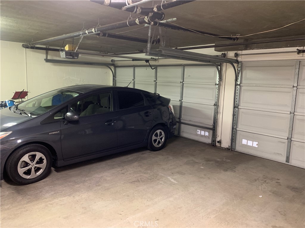 110 North Marengo Avenue, Unit D Alhambra, CA 91801 - Photo 14 of 14 a car parked in a garage
