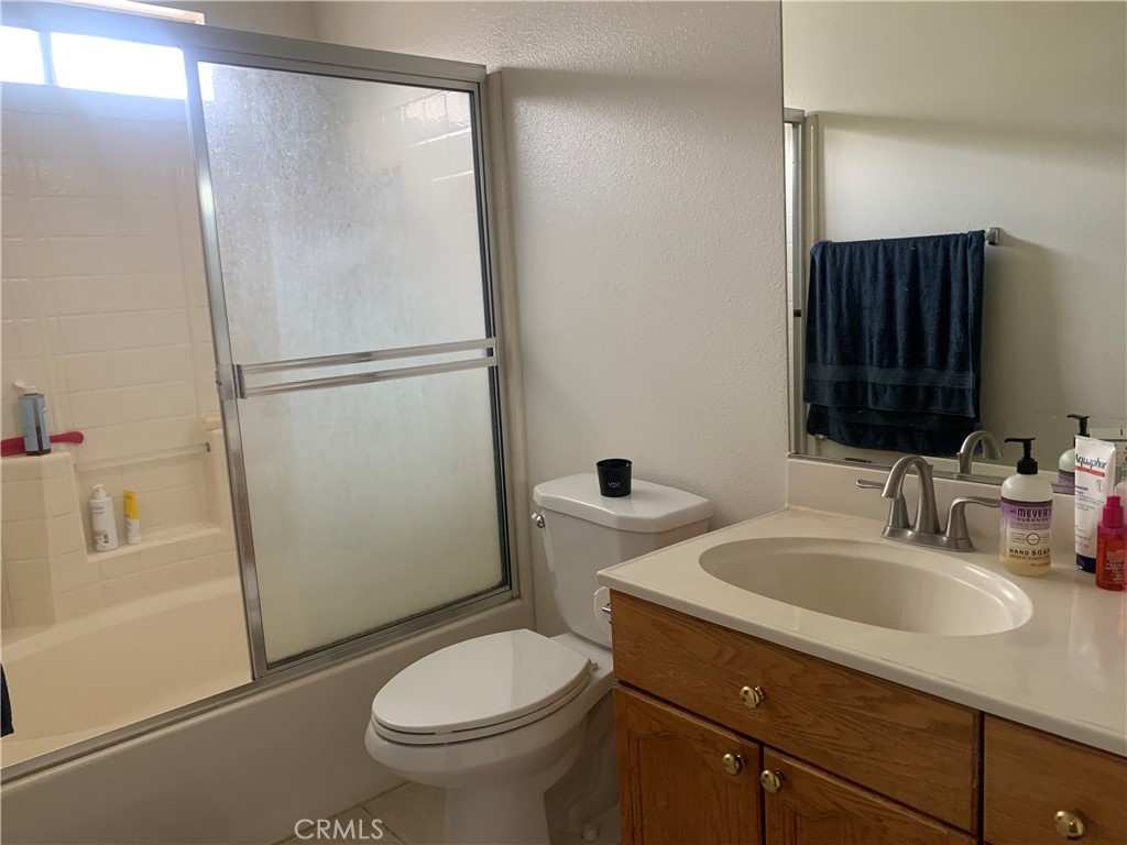 110 North Marengo Avenue, Unit D Alhambra, CA 91801 - Photo 9 of 14 a bathroom with a sink toilet and shower