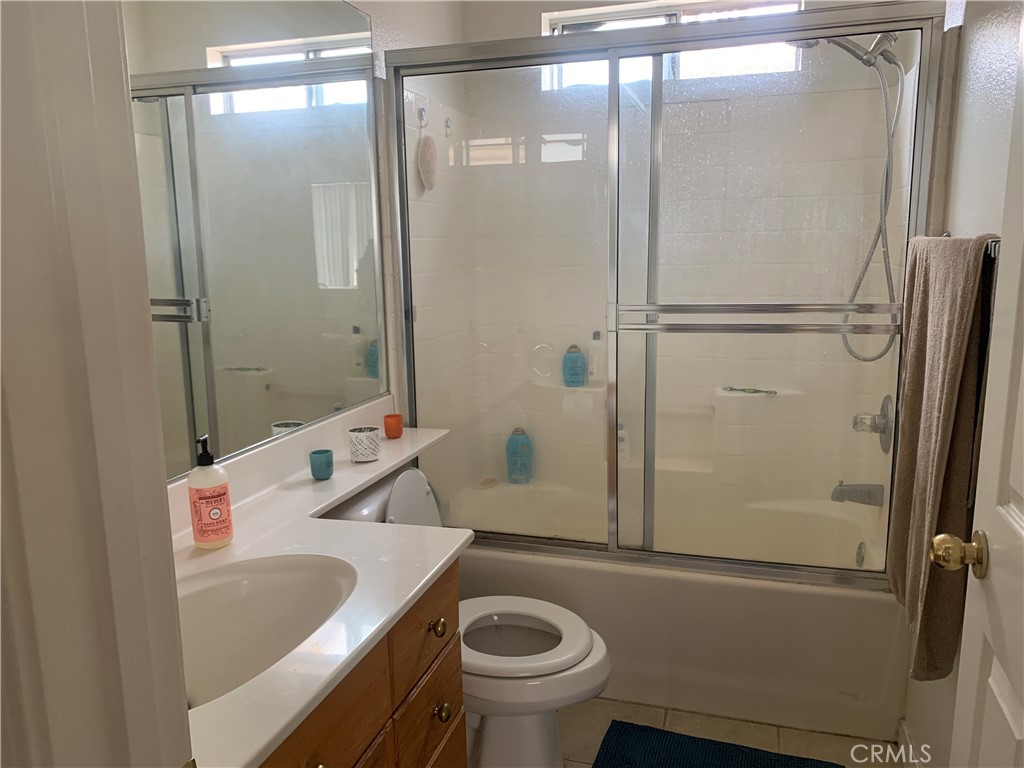 110 North Marengo Avenue, Unit D Alhambra, CA 91801 - Photo 10 of 14 a bathroom with a sink toilet and shower