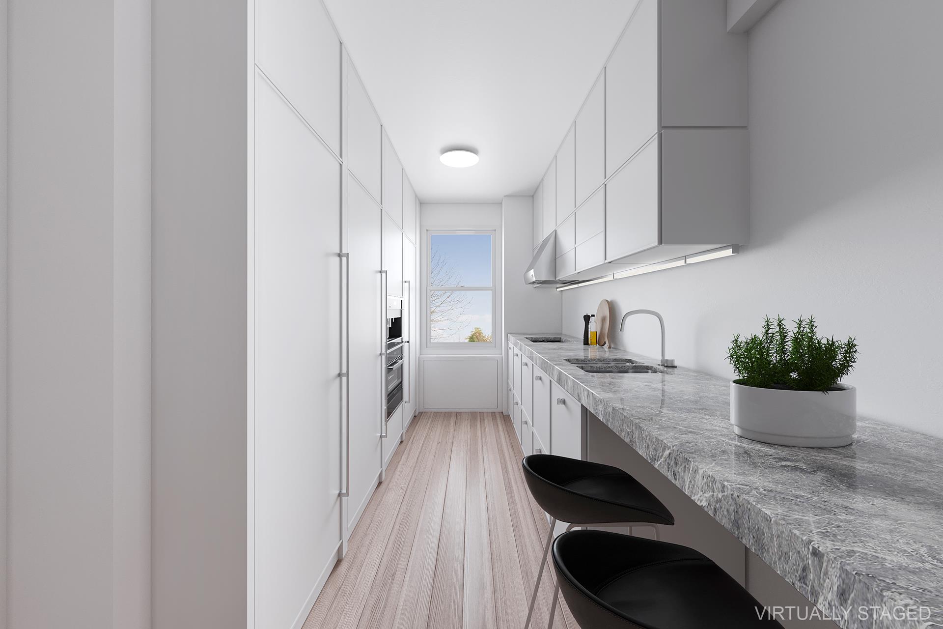 40 East 84th Street, Unit 4A Manhattan, NY 10028 - Photo 5 of 22 a kitchen with sink a stove and cabinets