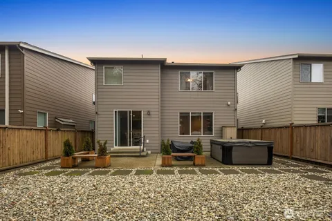 a backyard of a house with seating space