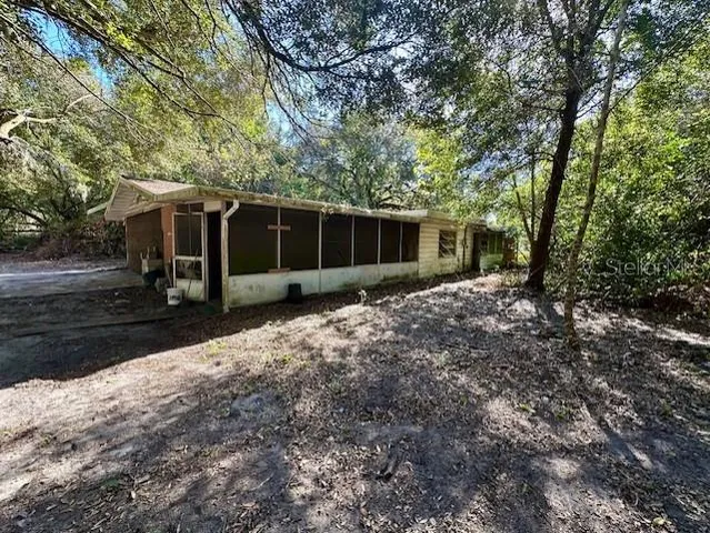 a kitchen with stainless steel appliances a stove and more cabinets