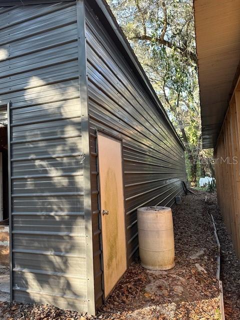 1918 Mountain Lake Cutoff Road Lake Wales, FL 33859 - Photo 23 of 38 a view of a house with a door