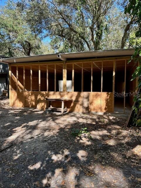 1918 Mountain Lake Cutoff Road Lake Wales, FL 33859 - Photo 26 of 38 a front view of house with yard space and patio