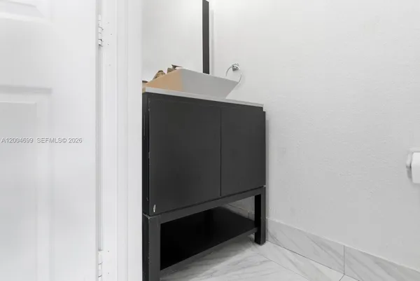 a bathroom with a toilet and a sink