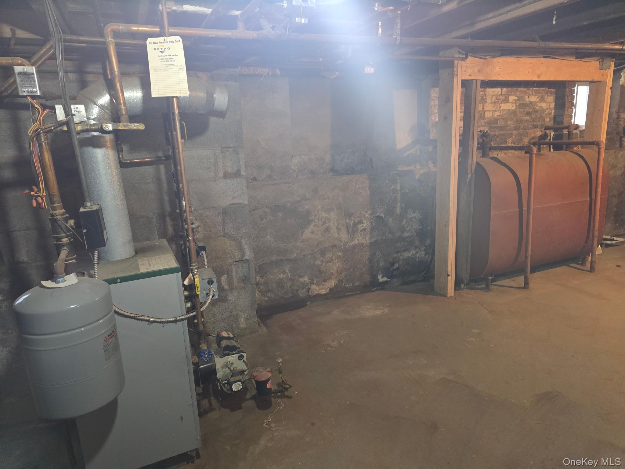 32 North Clover Street Poughkeepsie, NY 12601 - Photo 20 of 20 Unfinished basement with heating fuel and a heating unit