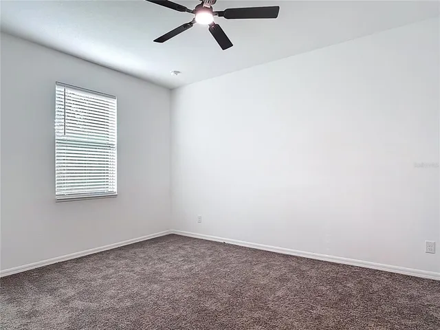 a bathroom with 2 sink and a mirror