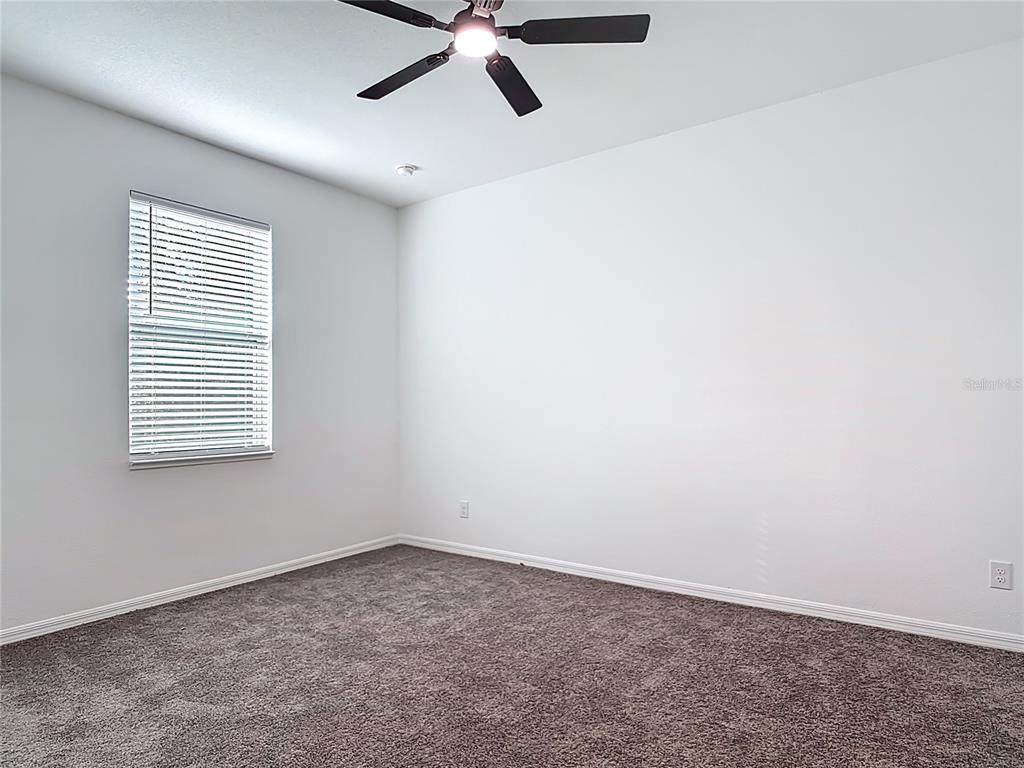 1204 Goshen Road North Port, FL 34288 - Photo 20 of 46 a view of an empty room with a window