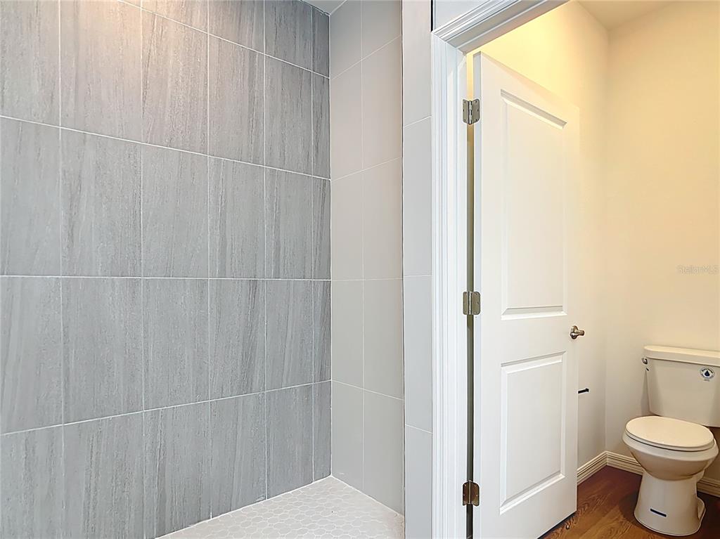 1204 Goshen Road North Port, FL 34288 - Photo 23 of 46 a bathroom with a toilet and a shower