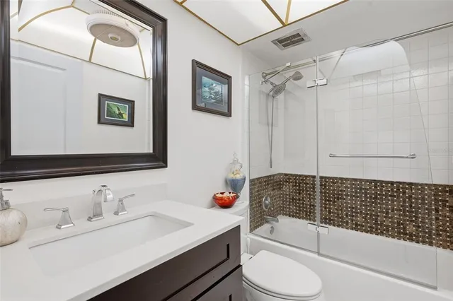 an aerial view of residential houses with city view