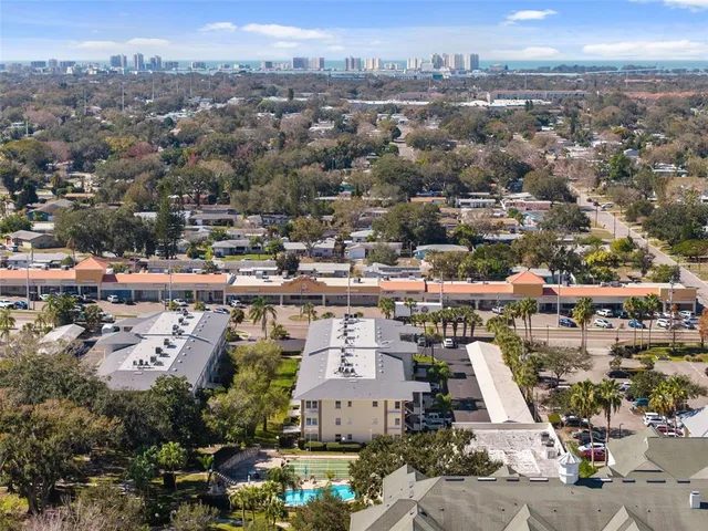 a room with furniture and pool table