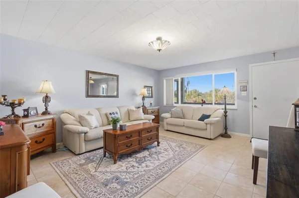 a living room with furniture and a couch