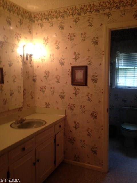 6286 Pleasant Grove Church Road Bennett, NC 27208 - Photo 11 of 18 Hall bath has double bowls, tub/shower combo