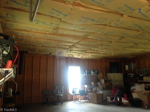 6286 Pleasant Grove Church Road Bennett, NC 27208 - Photo 6 of 18 interior of detached garage.. has electric, water and gas heater