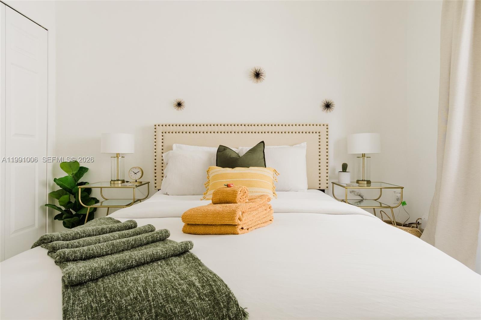 8765 Northwest 22nd Place Miami, FL 33147 - Photo 20 of 37 a bedroom with a bed and window