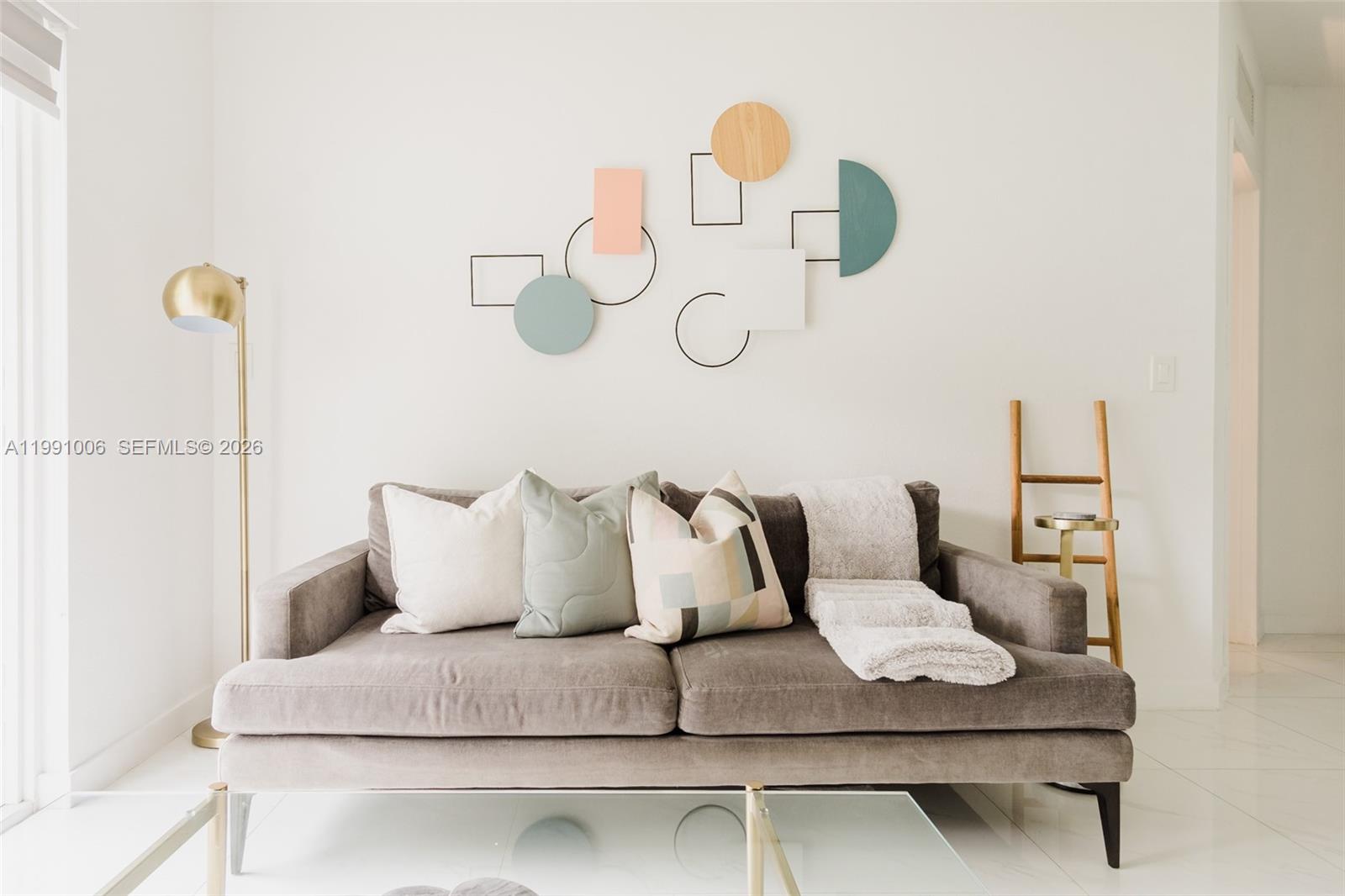 8765 Northwest 22nd Place Miami, FL 33147 - Photo 6 of 37 a living room with furniture