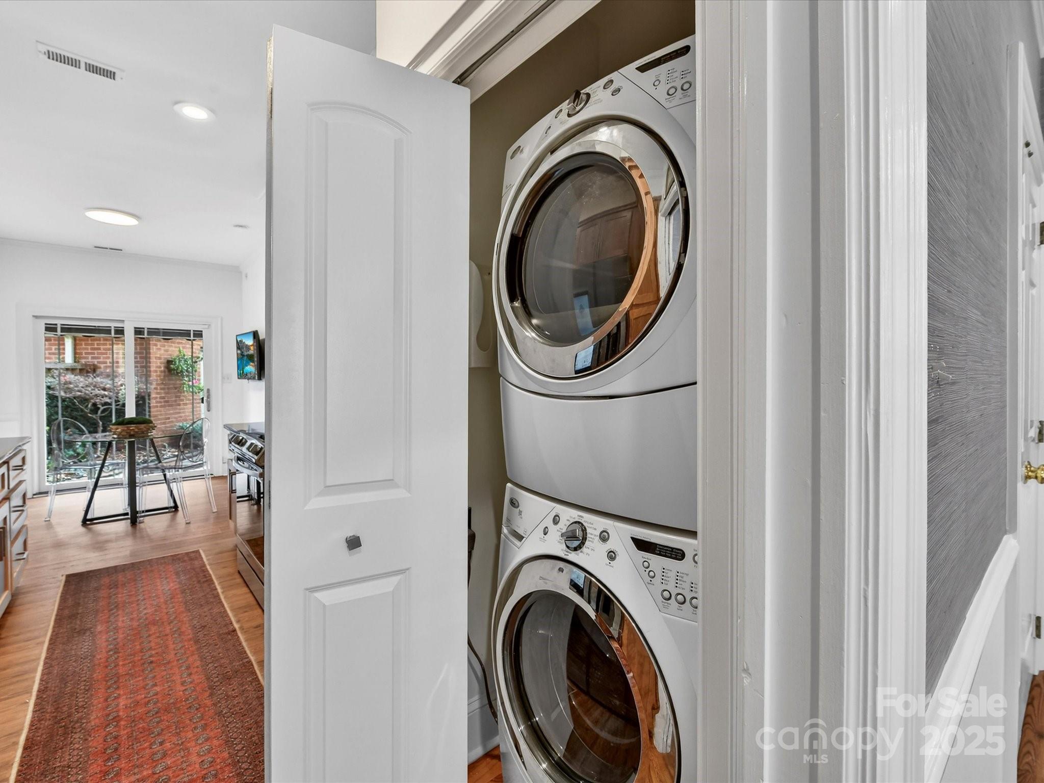 2813 Sharon View Road Charlotte, NC 28210 - Photo 18 of 40 a view of a hallway with washer and dryer