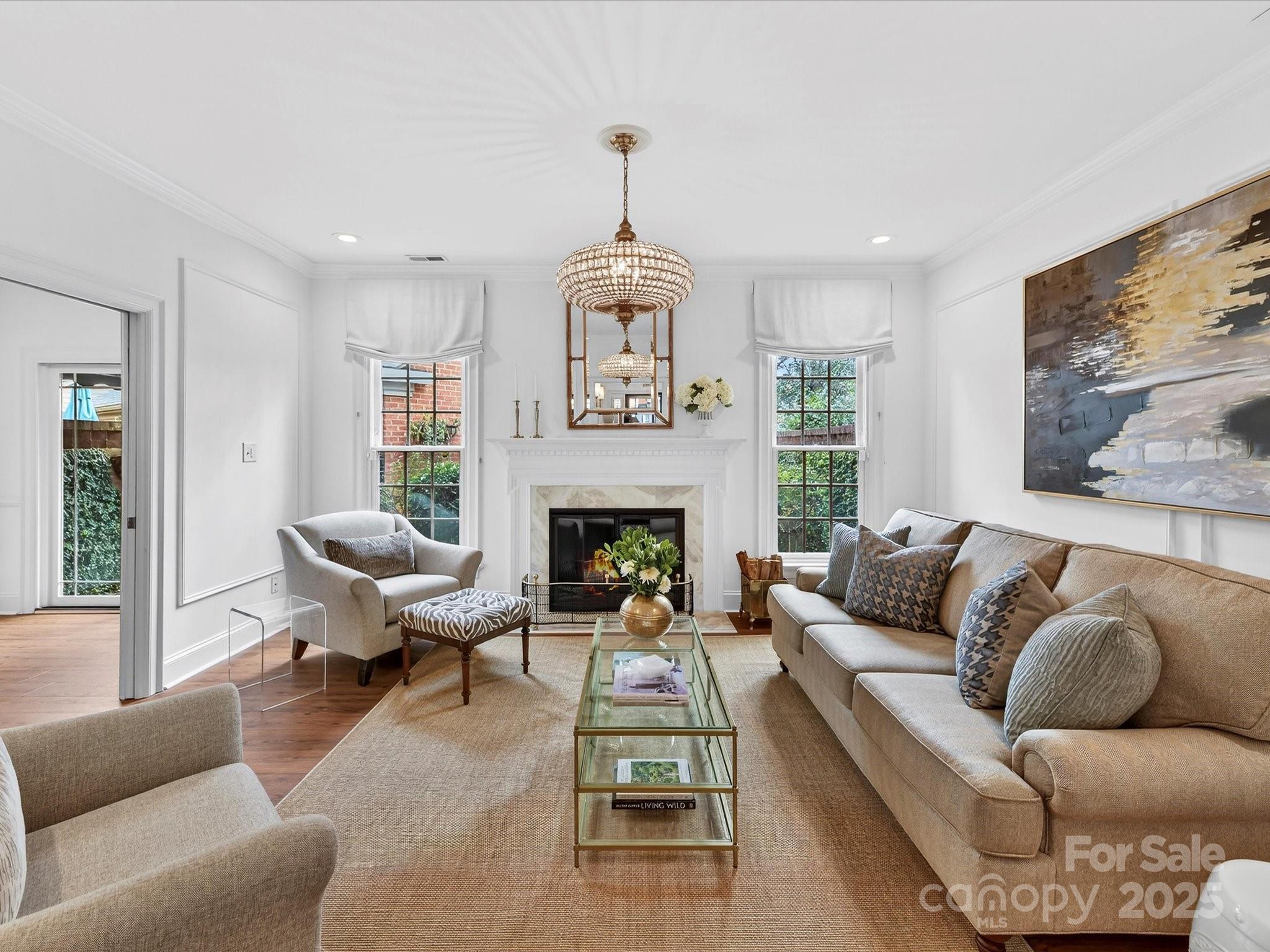 2813 Sharon View Road Charlotte, NC 28210 - Photo 6 of 40 a living room with furniture and a fireplace