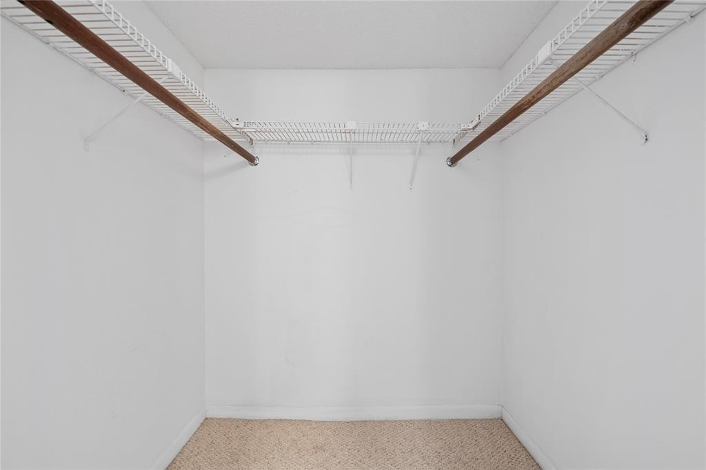 8105 Northwest 61st Street, Unit A206 Tamarac, FL 33321 - Photo 21 of 44 a view of a room with shelf