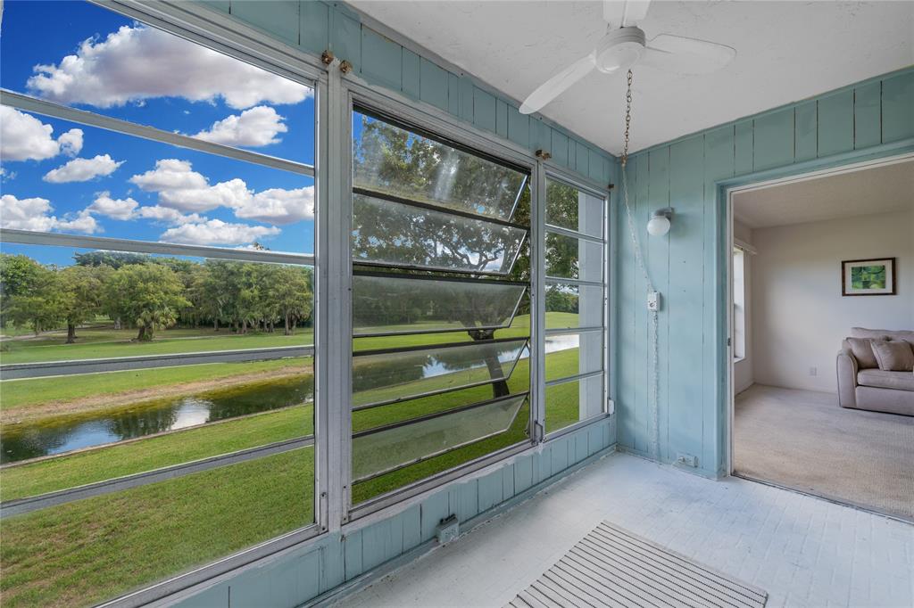8105 Northwest 61st Street, Unit A206 Tamarac, FL 33321 - Photo 43 of 44 a view of a glass door