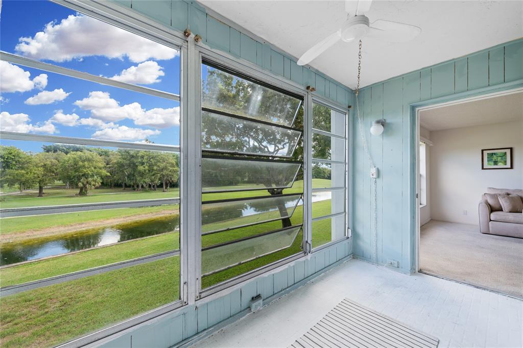 8105 Northwest 61st Street, Unit A206 Tamarac, FL 33321 - Photo 44 of 44 a view of outdoor space with seating area