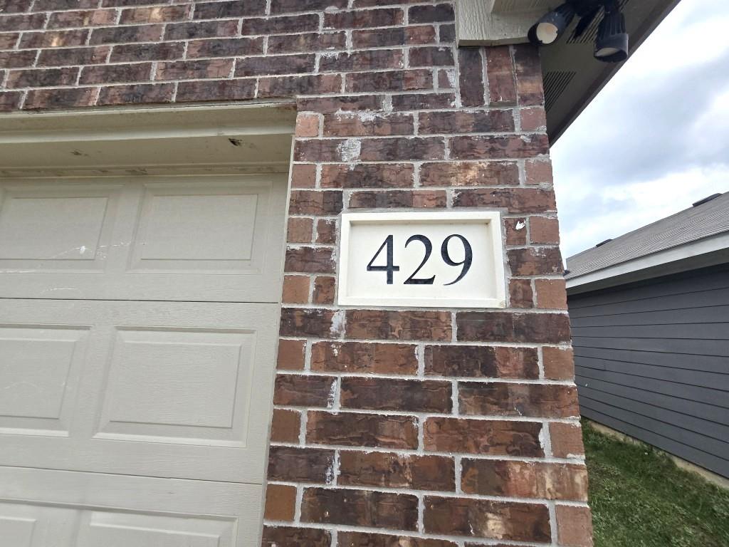 429 Shorty Street Mabank, TX 75147 - Photo 18 of 25 address block on brick