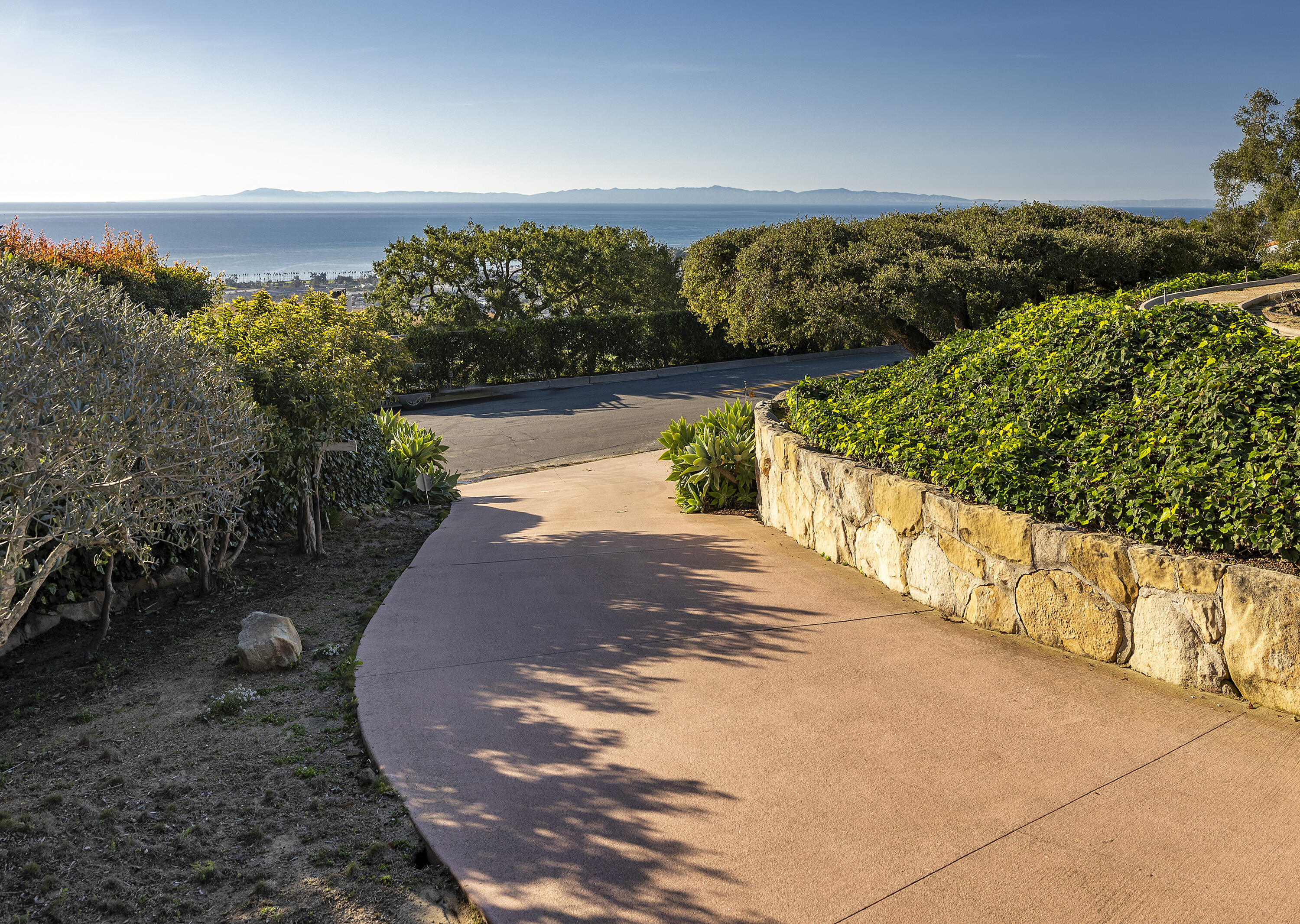 1320 Mission Ridge Road Santa Barbara, CA 93103 - Photo 24 of 27 a view of a lake from a yard
