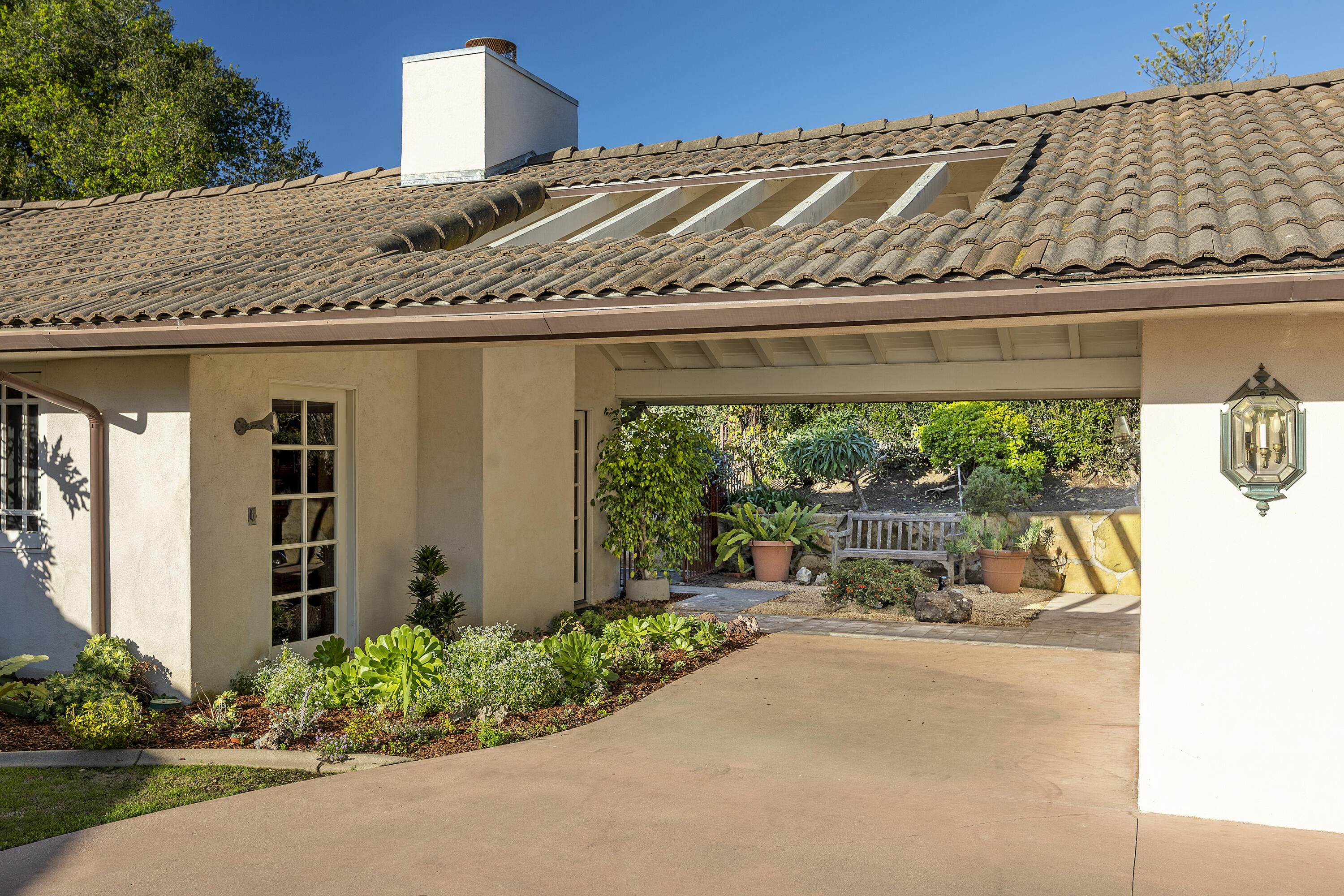 1320 Mission Ridge Road Santa Barbara, CA 93103 - Photo 25 of 27 a front view of a house with a yard
