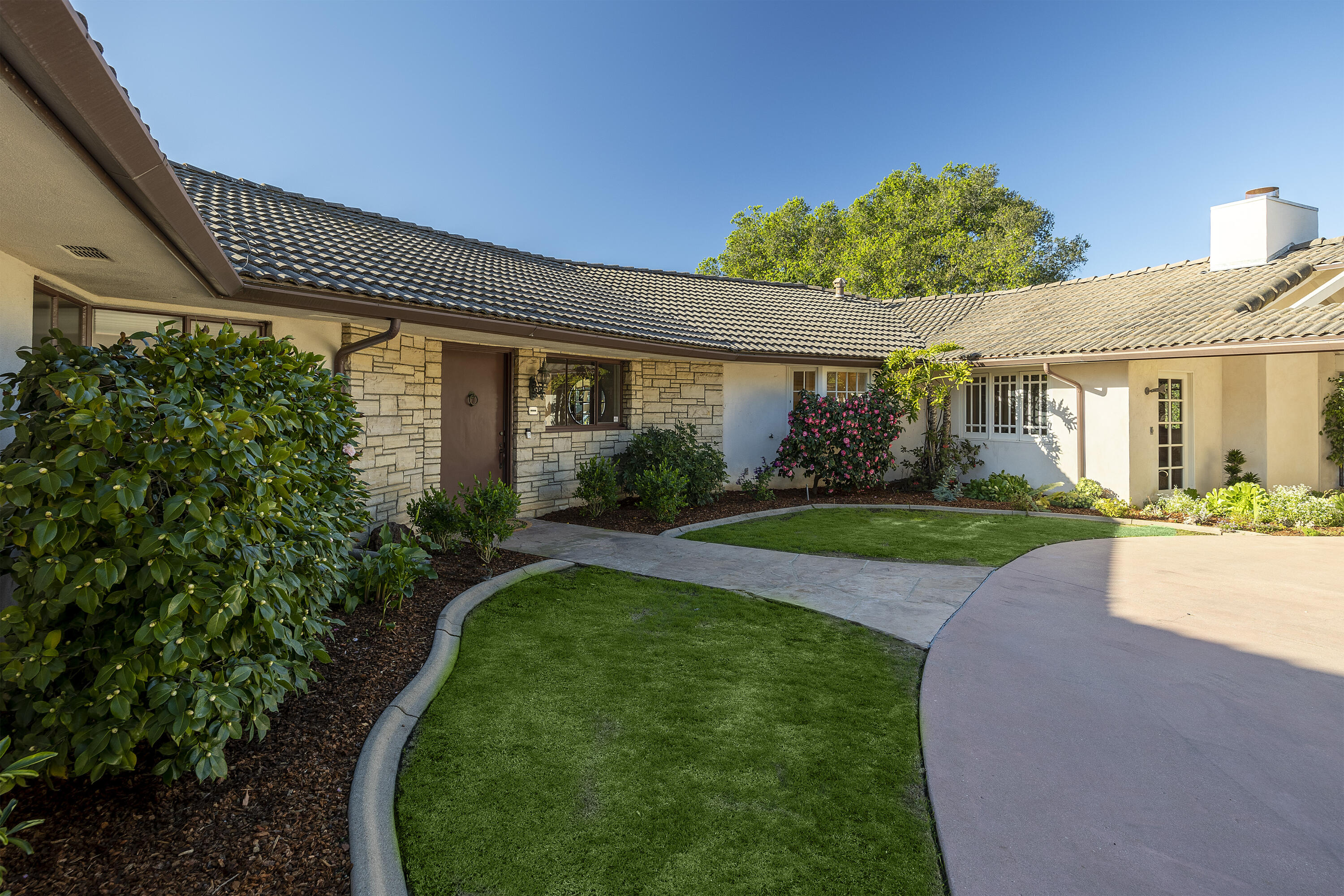 1320 Mission Ridge Road Santa Barbara, CA 93103 - Photo 6 of 27 a view of a house with a garden