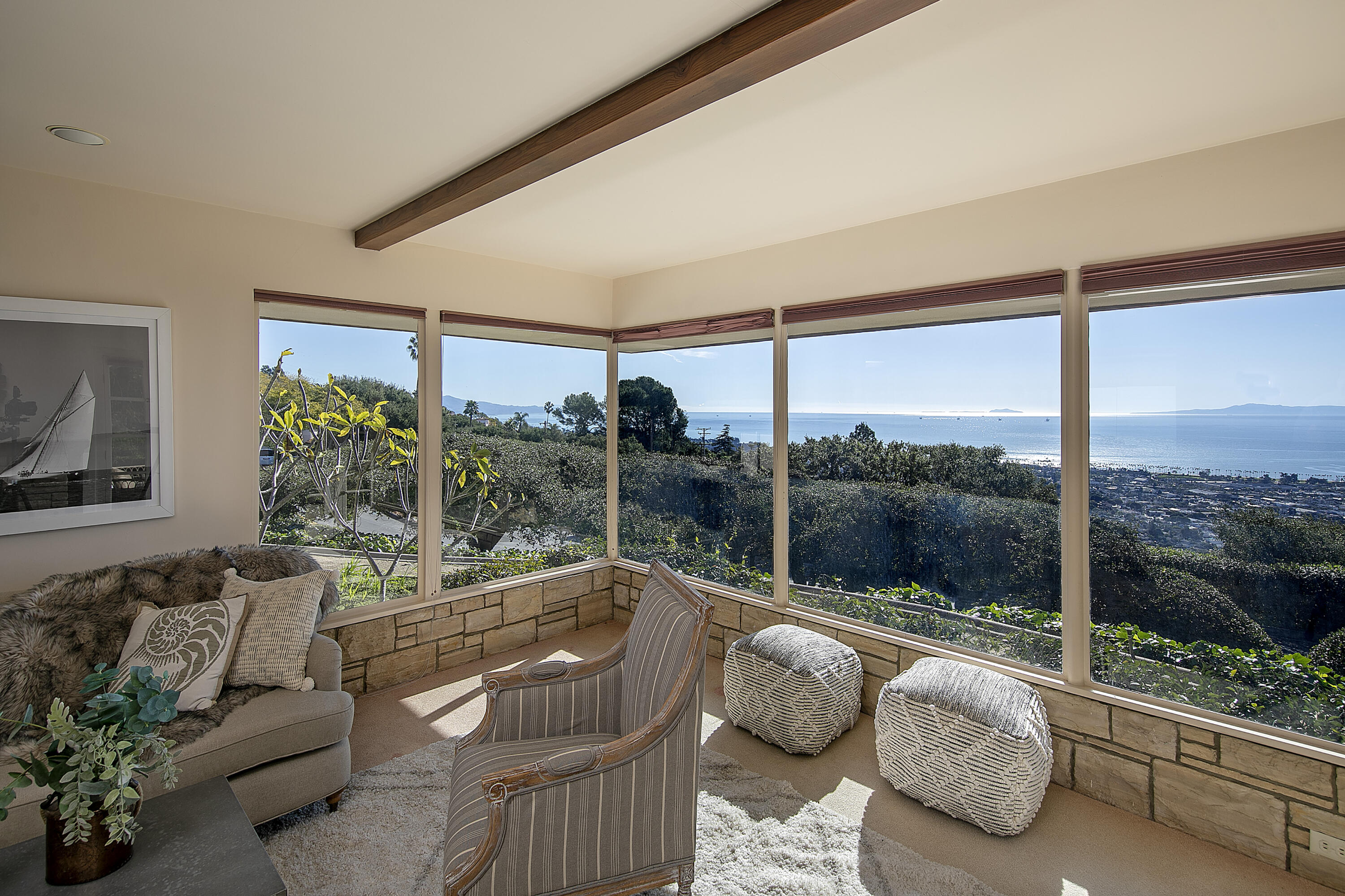 1320 Mission Ridge Road Santa Barbara, CA 93103 - Photo 8 of 27 a living room with patio furniture and a floor to ceiling window