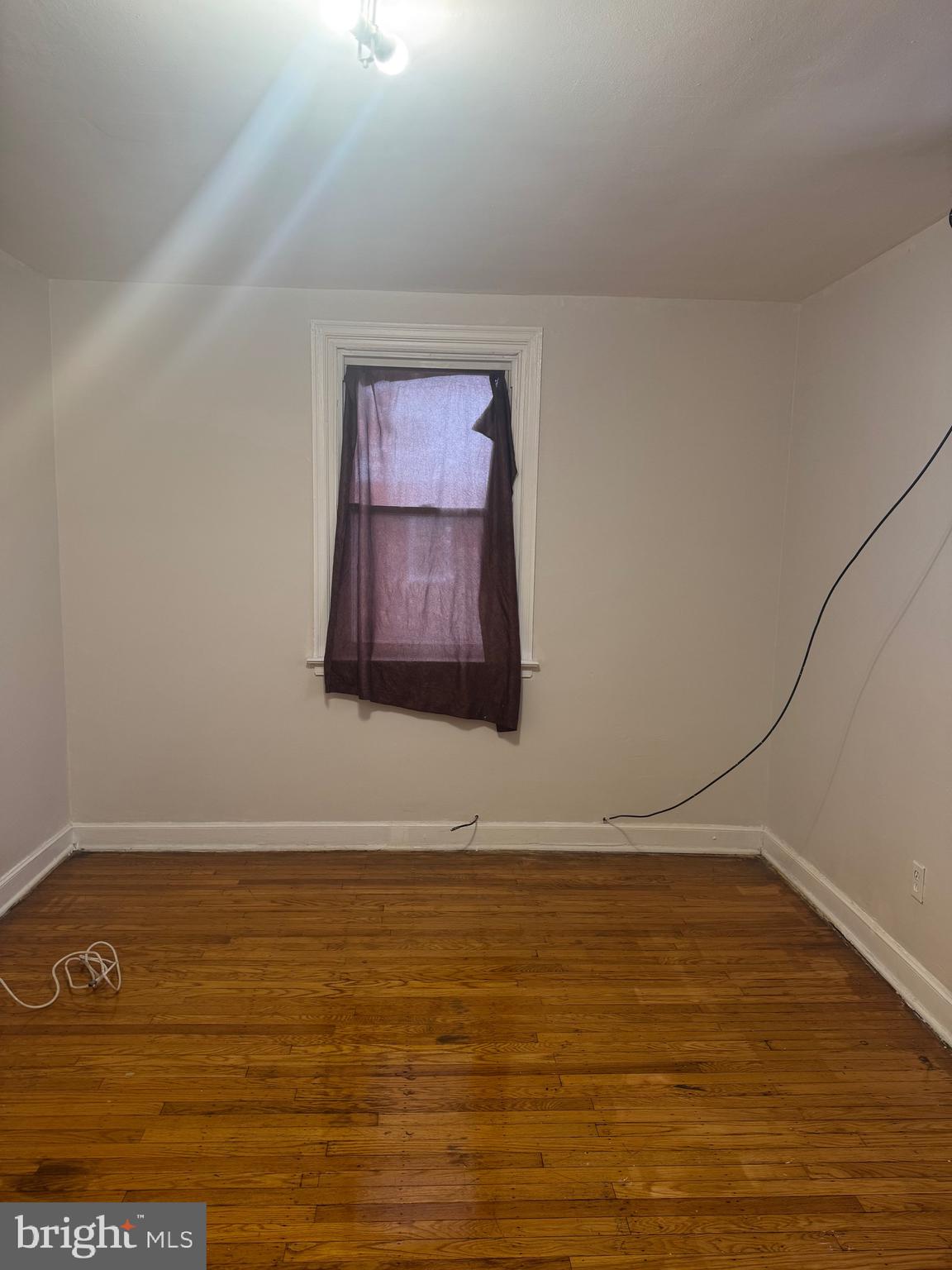 8340 Temple Road Philadelphia, PA 19150 - Photo 3 of 6 a view of room with wooden floor
