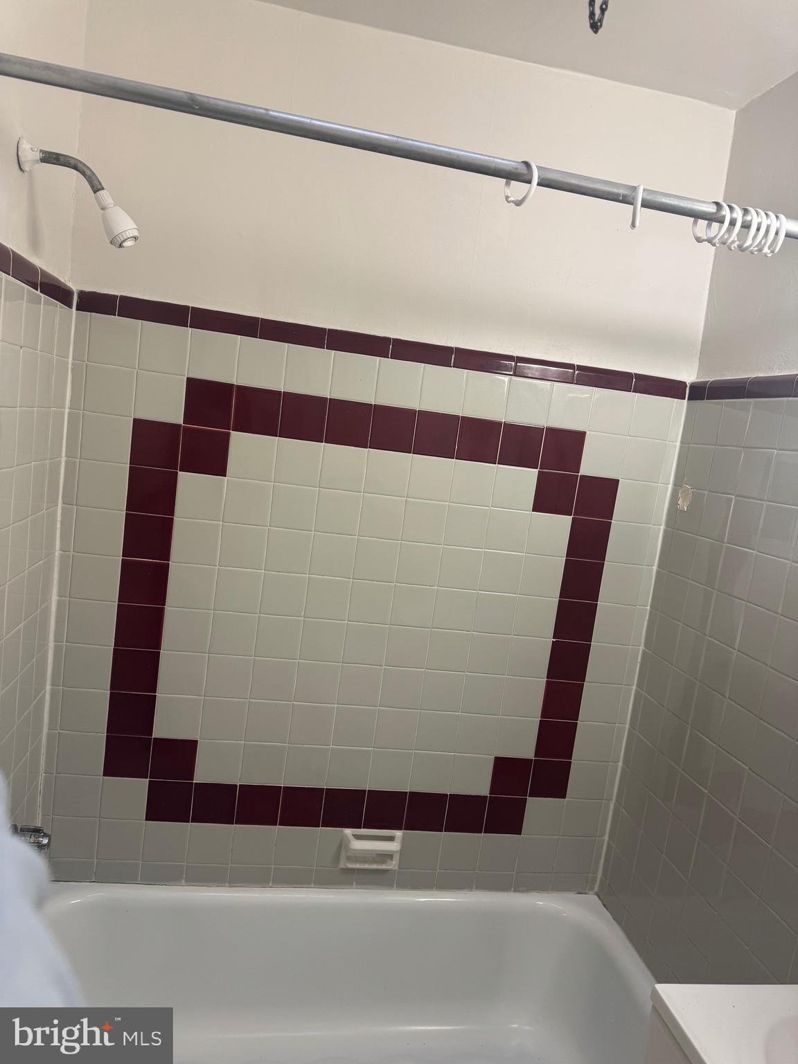 8340 Temple Road Philadelphia, PA 19150 - Photo 4 of 6 a bathroom with a bathtub