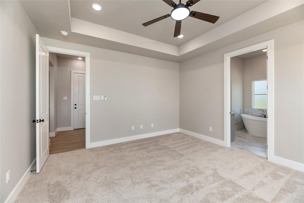 217 Fm 2258 Venus, TX 76084 - Photo 32 of 36 an empty room and a ceiling fan in a room