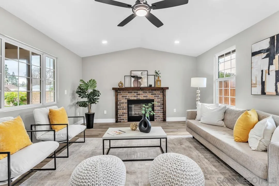 9209 Arnaz Way Santee, CA 92071 - Photo 17 of 39 a living room with furniture and a fireplace