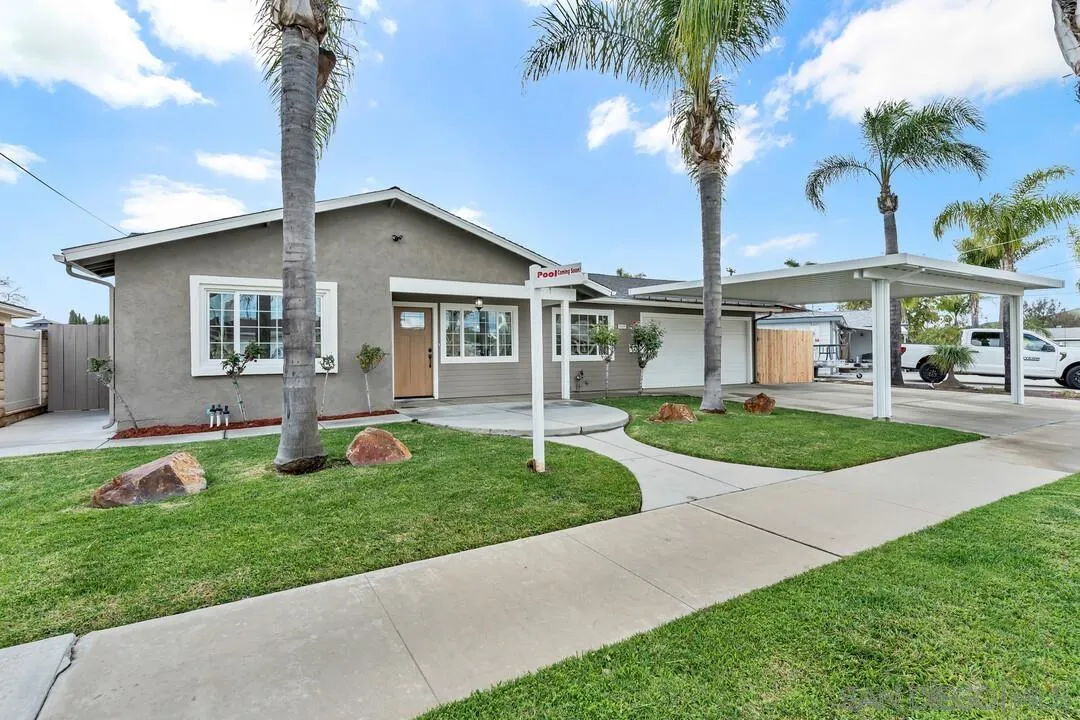 9209 Arnaz Way Santee, CA 92071 - Photo 2 of 39 a front view of house with yard and green space